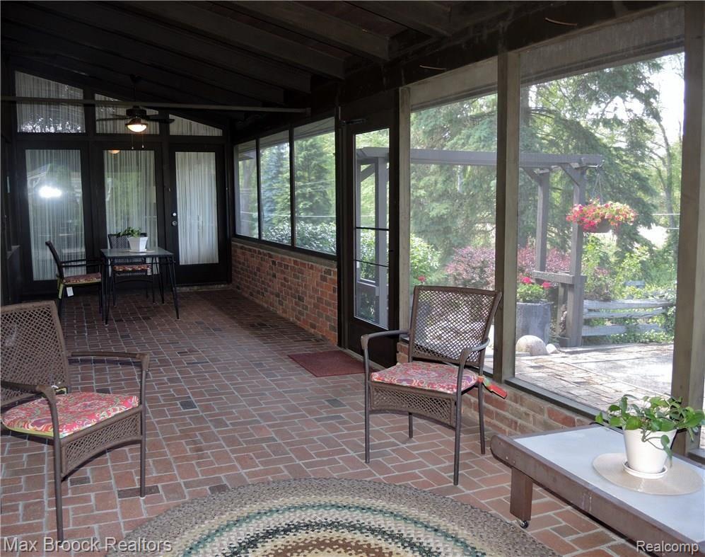 840 North Pemberton Road Bloomfield Hills, MI 48302 - Photo 29 of 42 TRANQUIL ENCLOSED PORCH WITH LIGHTING
