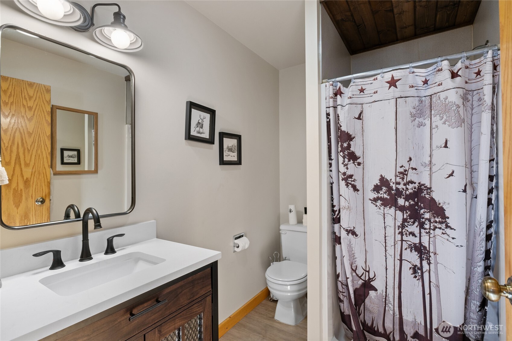 661 Pacific Avenue Ronald, WA 98940 - Photo 26 of 38 a bathroom with a toilet sink and mirror