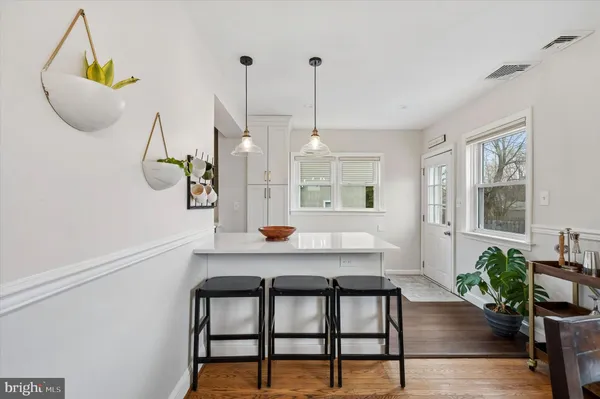 a view of dining room and wooden floor