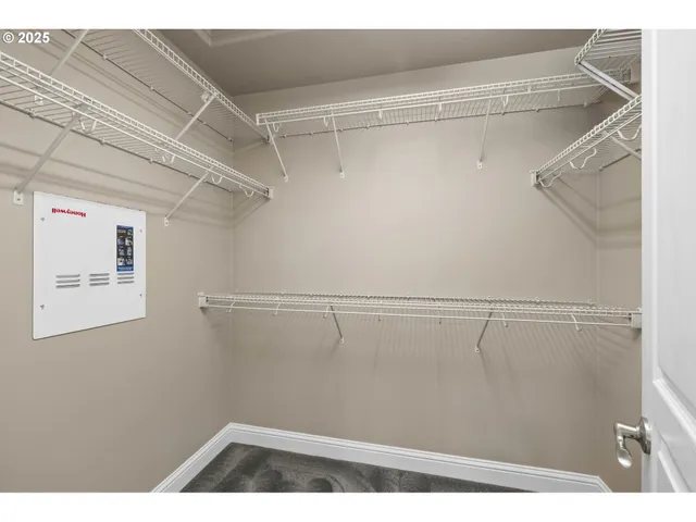 a view of a room with racks on the wall