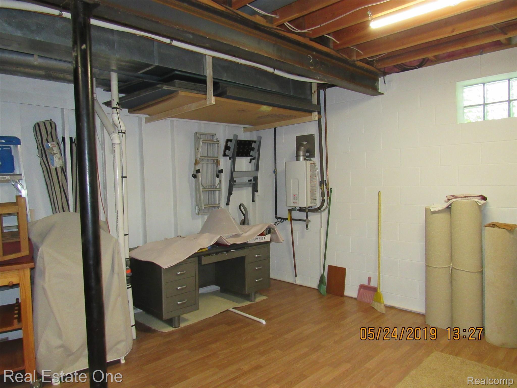 384 Nakomis Road Lake Orion, MI 48362 - Photo 67 of 77 Work Area - Tankless ON DEMAND Hot Water Heater!!!