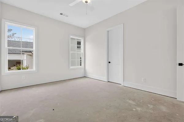 a bathroom with a sink vanity and a mirror