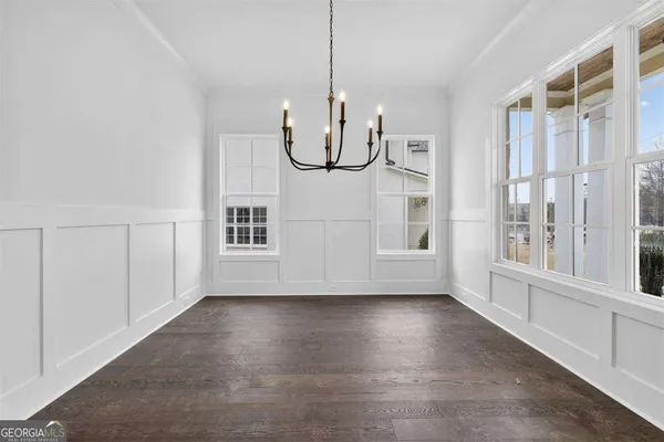 a kitchen with counter top space cabinets and stainless steel appliances