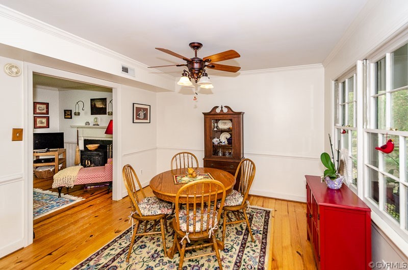 9724 Kendrick Road North Chesterfield, VA 23236 - Photo 15 of 38 a dining room with furniture and wooden floor
