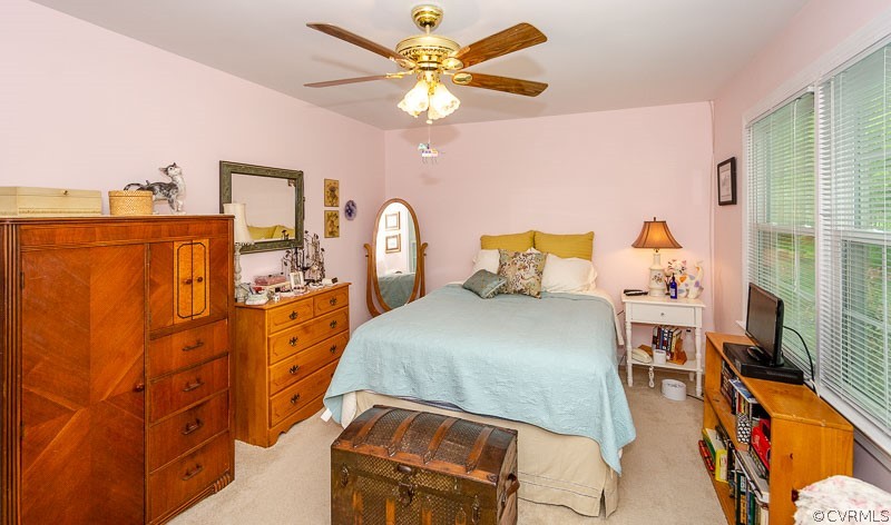 9724 Kendrick Road North Chesterfield, VA 23236 - Photo 28 of 38 a bedroom with a bed and wooden floor