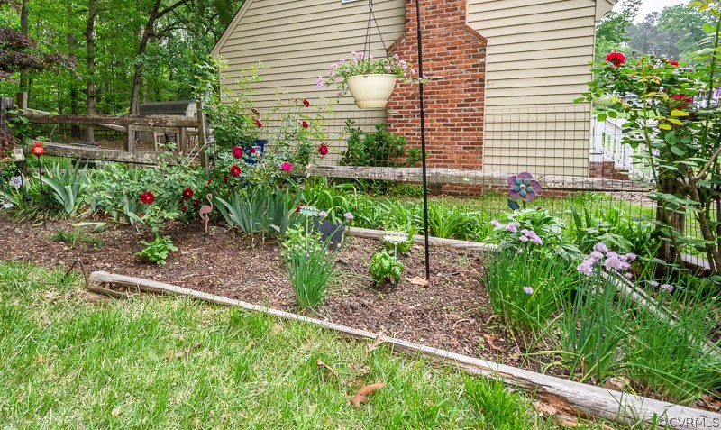 9724 Kendrick Road North Chesterfield, VA 23236 - Photo 3 of 38 a house view with a garden space