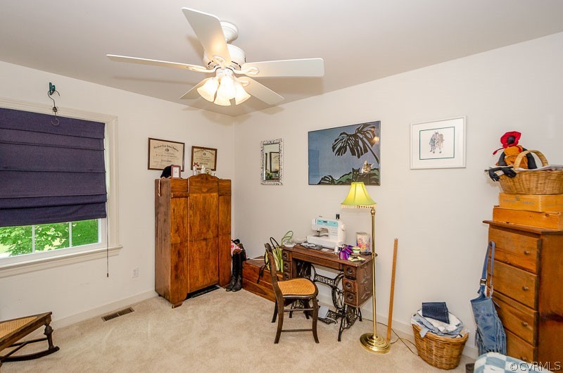 9724 Kendrick Road North Chesterfield, VA 23236 - Photo 31 of 38 a view of a workspace with furniture and a window