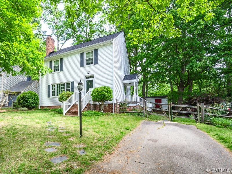 9724 Kendrick Road North Chesterfield, VA 23236 - Photo 36 of 38 a view of a house with a yard and sitting area
