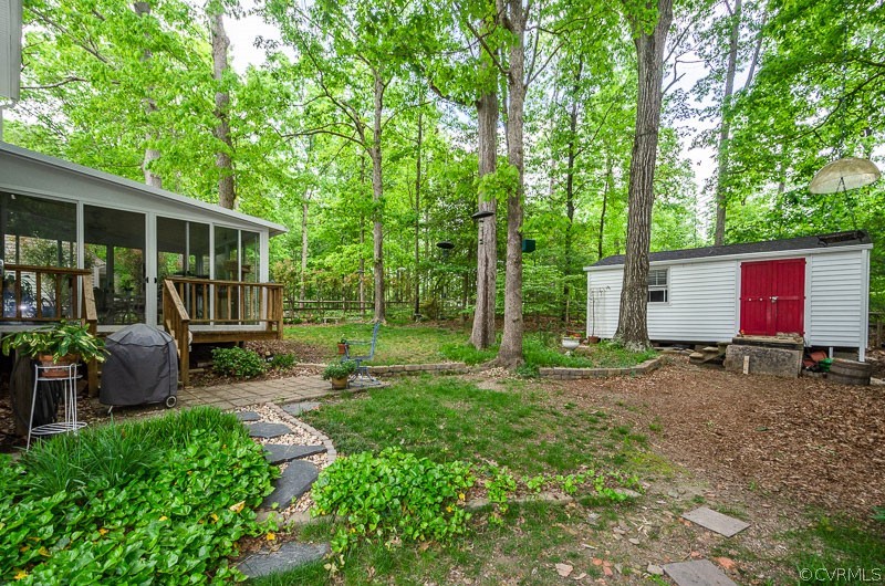 9724 Kendrick Road North Chesterfield, VA 23236 - Photo 6 of 38 a backyard of a house with seating space