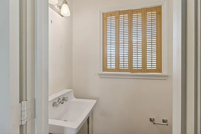 a view of a room that has a window in it