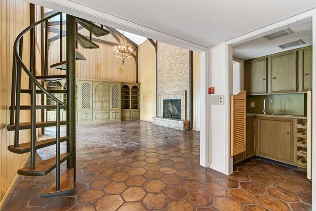 a view of a entryway with furniture and a window