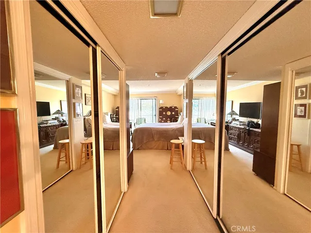 a lobby with furniture and a table