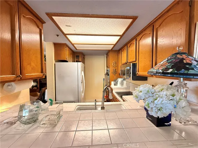 a lobby with furniture and floor to ceiling window