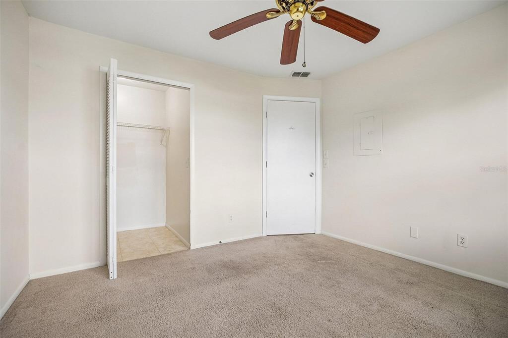 26485 Rampart Boulevard, Unit A27 Punta Gorda, FL 33983 - Photo 16 of 27 an empty room with a window