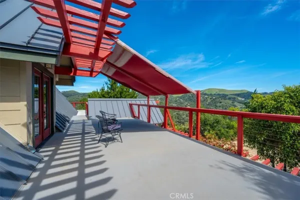 a balcony with an outdoor space