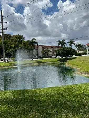 a view of a lake with a big yard