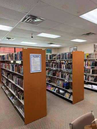 a view of a livingroom with shelves
