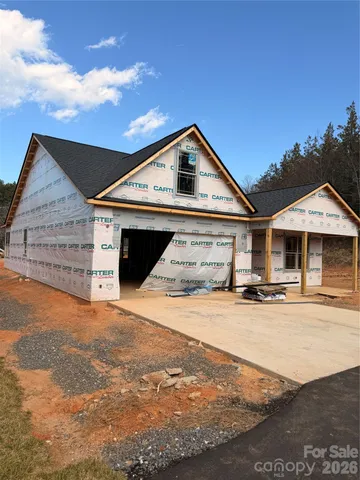 a front view of a house with yard