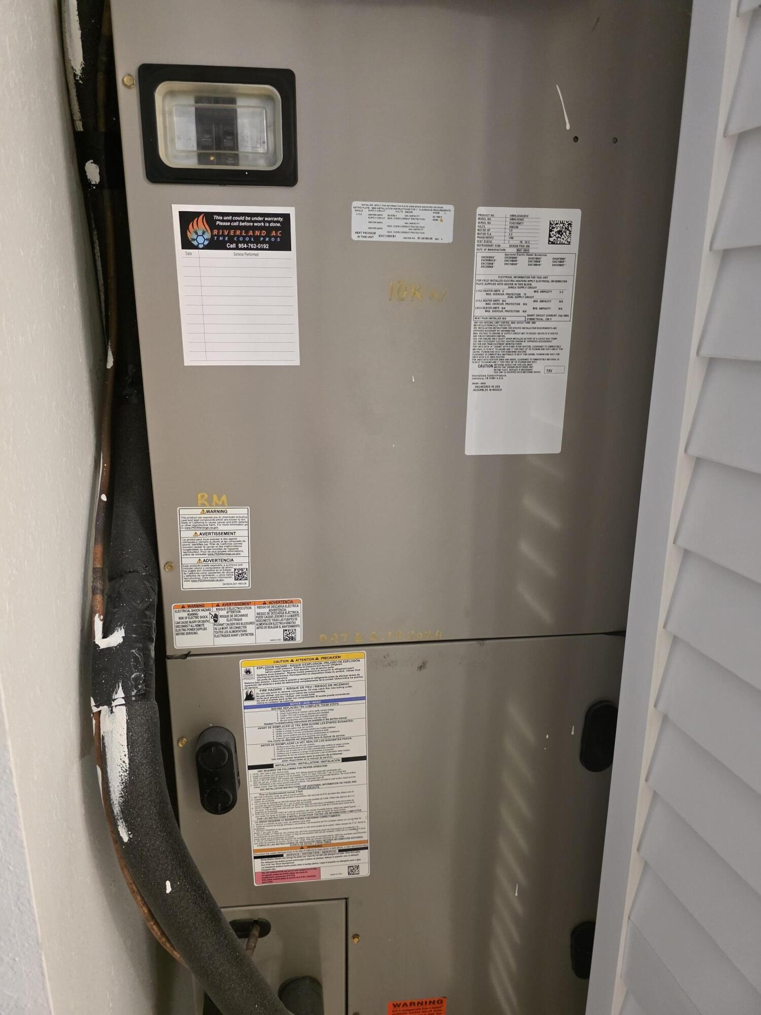 10851 Palm Ridge Lane Tamarac, FL 33321 - Photo 15 of 40 a utility room with dryer and washer