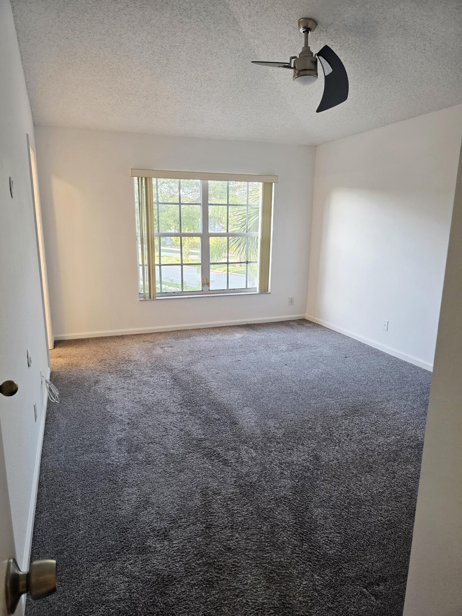 10851 Palm Ridge Lane Tamarac, FL 33321 - Photo 21 of 40 a view of room with a window