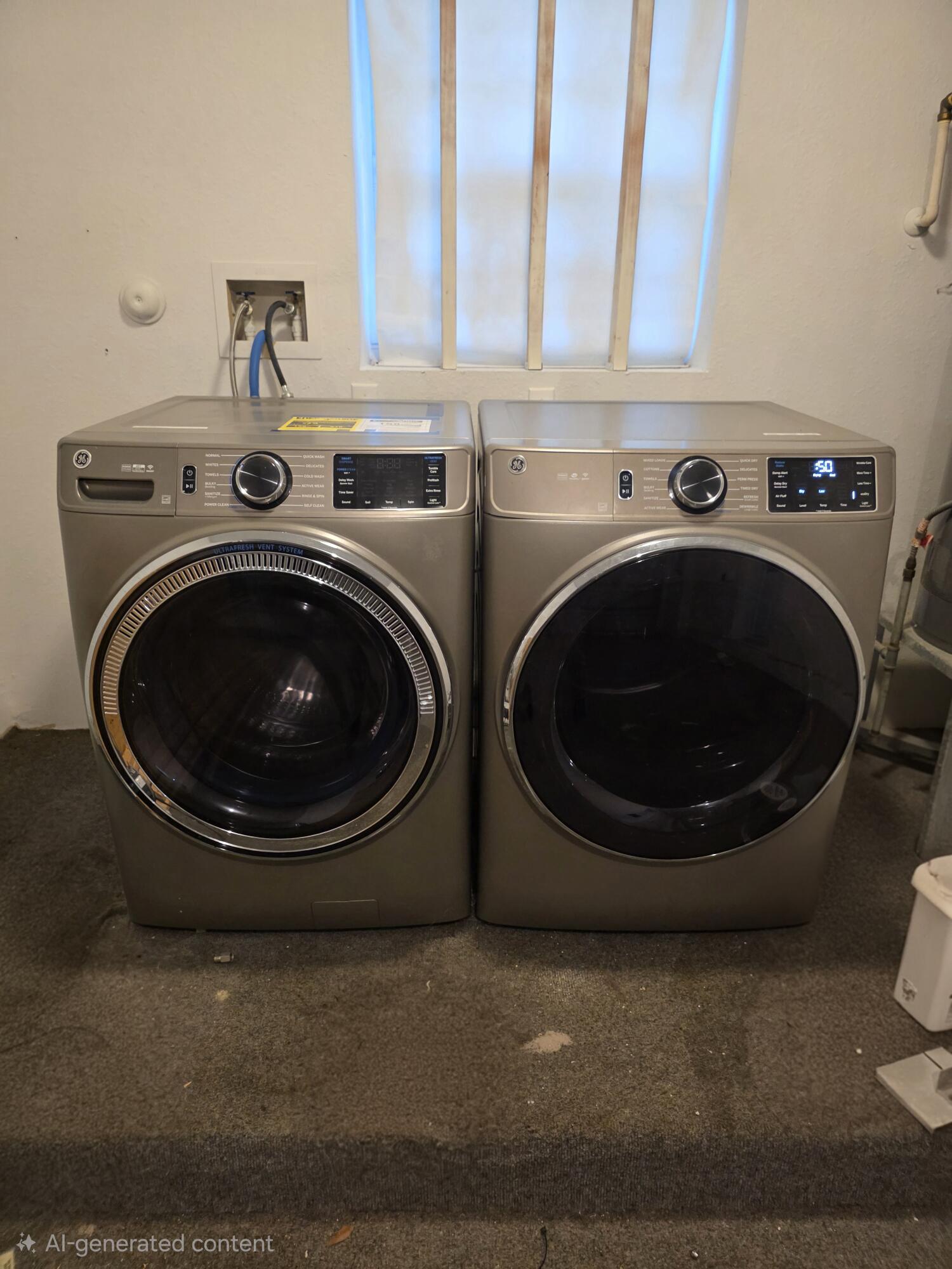 10851 Palm Ridge Lane Tamarac, FL 33321 - Photo 27 of 40 a utility room with dryer and washer