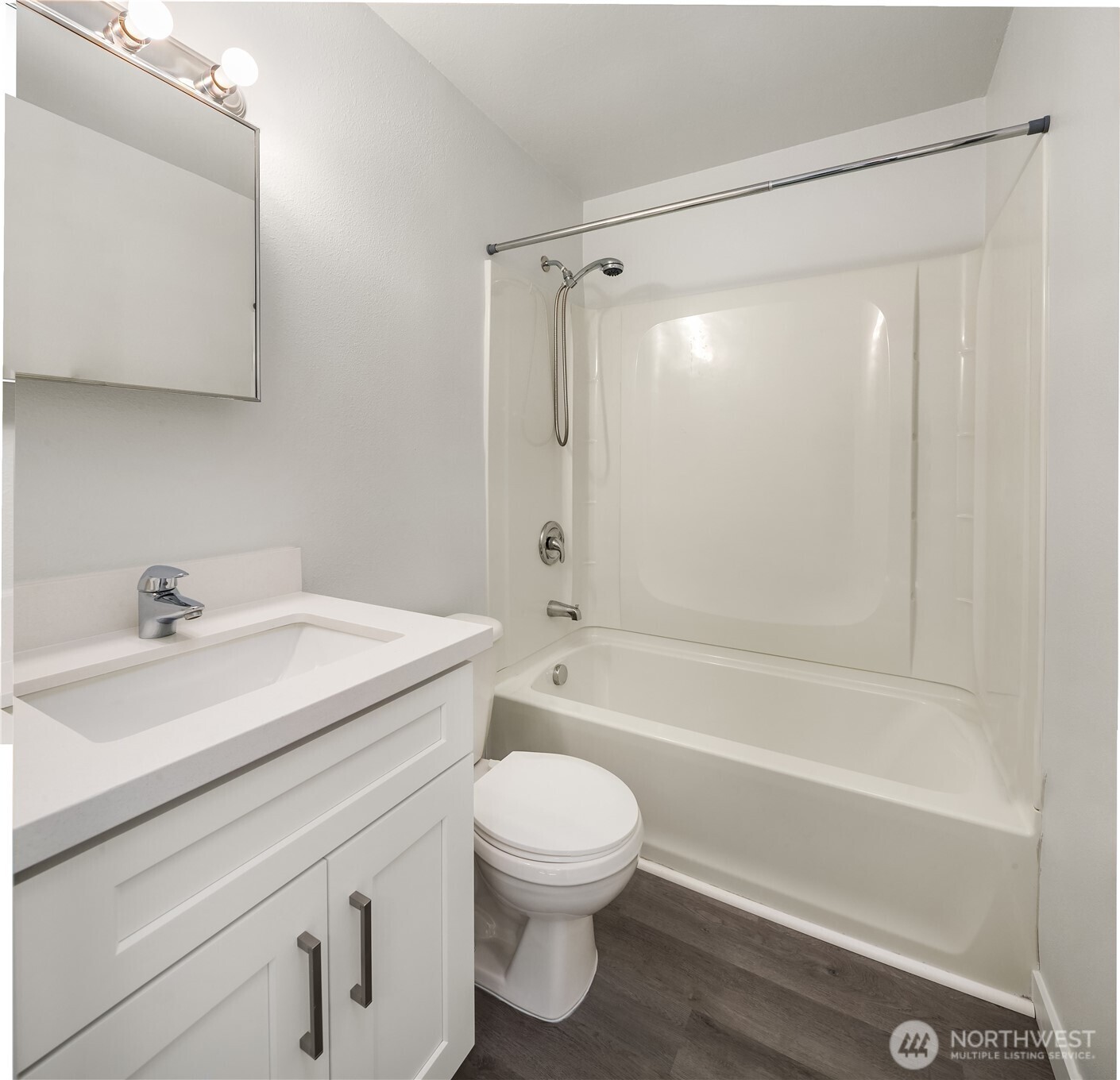 420 107th Place Southwest, Unit 2 Everett, WA 98204 - Photo 9 of 13 a bathroom with a sink a toilet and a bathtub