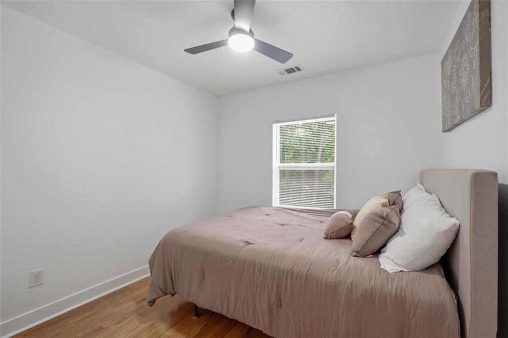965 Houston Mill Road Northeast Atlanta, GA 30329 - Photo 23 of 42 a bedroom with a bed and a window