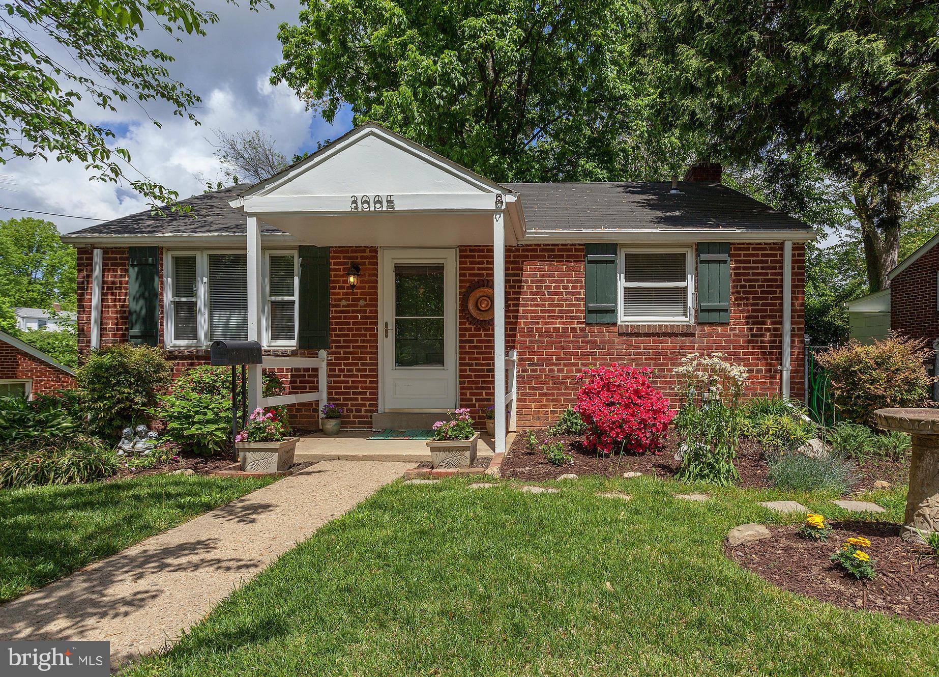 3005 Weisman Road Silver Spring, MD 20902 - Photo 1 of 29 a front view of a house with yard