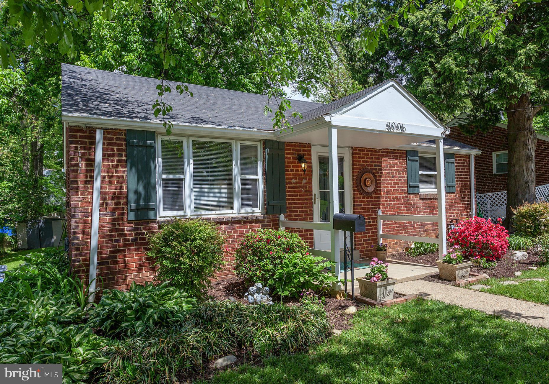 3005 Weisman Road Silver Spring, MD 20902 - Photo 3 of 29 front view of a house with a yard