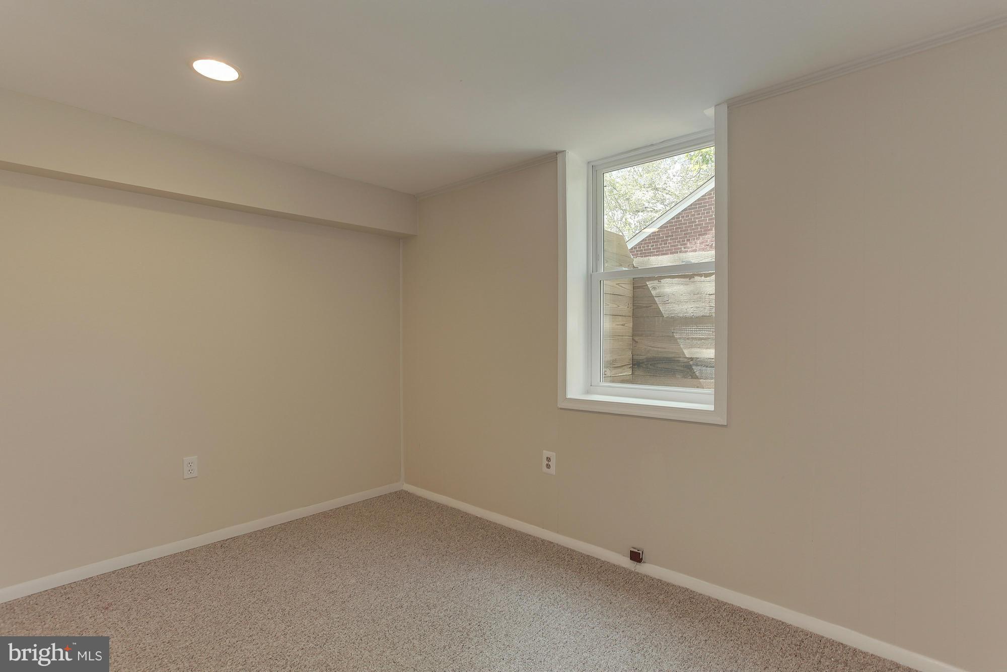 3005 Weisman Road Silver Spring, MD 20902 - Photo 21 of 29 an empty room with a window