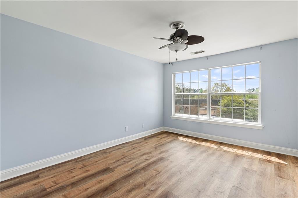 6980 Roswell Road, Unit K4 Atlanta, GA 30328 - Photo 21 of 31 a view of an empty room with a window