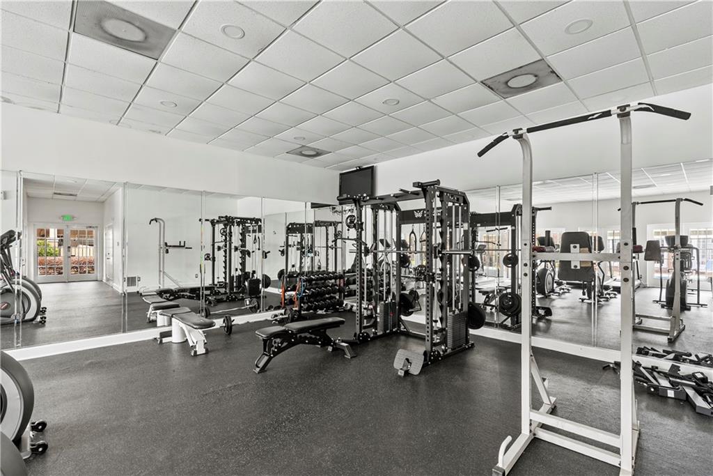 6980 Roswell Road, Unit K4 Atlanta, GA 30328 - Photo 8 of 31 a view of a room with gym equipment
