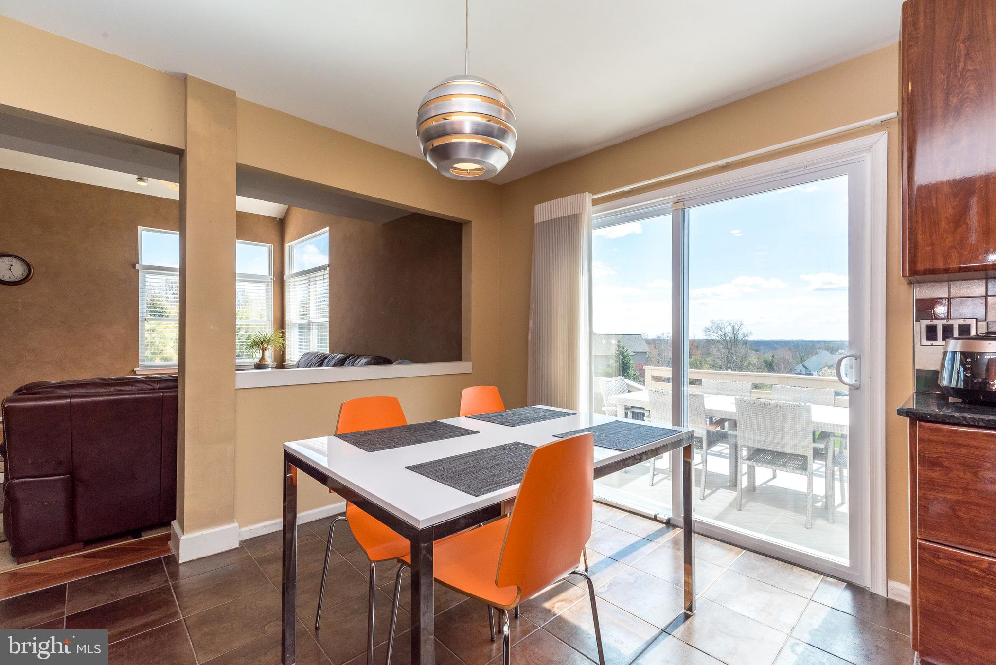 201 Summer Ridge Circle Chalfont, PA 18914 - Photo 42 of 94 Breakfast area with sliding door access to deck
