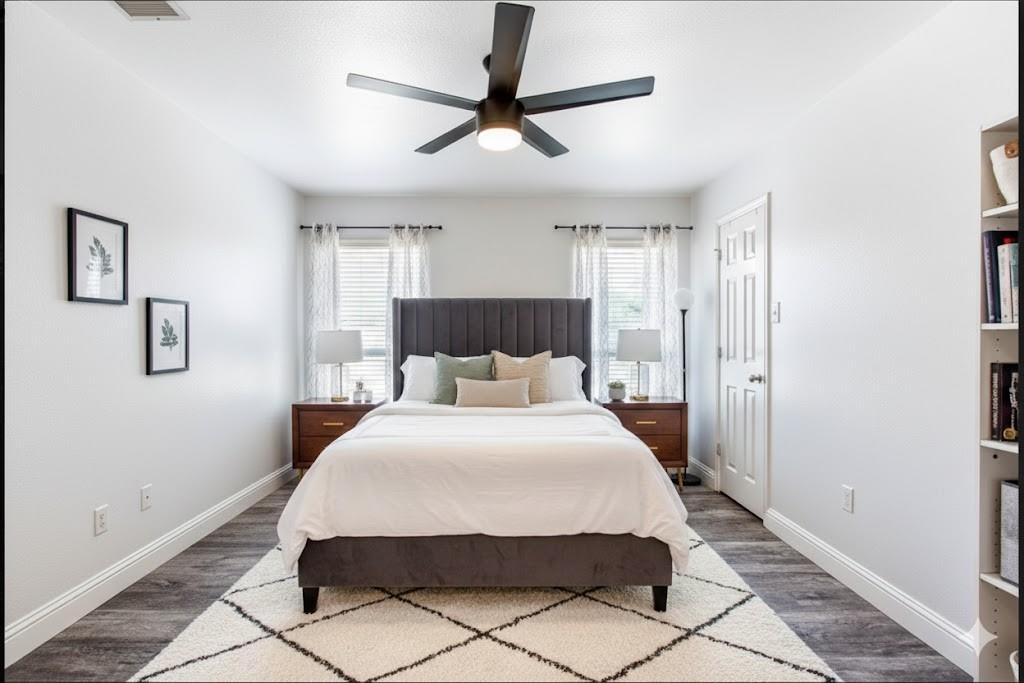 4020 Cherry Ridge Drive Frisco, TX 75033 - Photo 4 of 12 a bedroom with a bed and painting on the wall