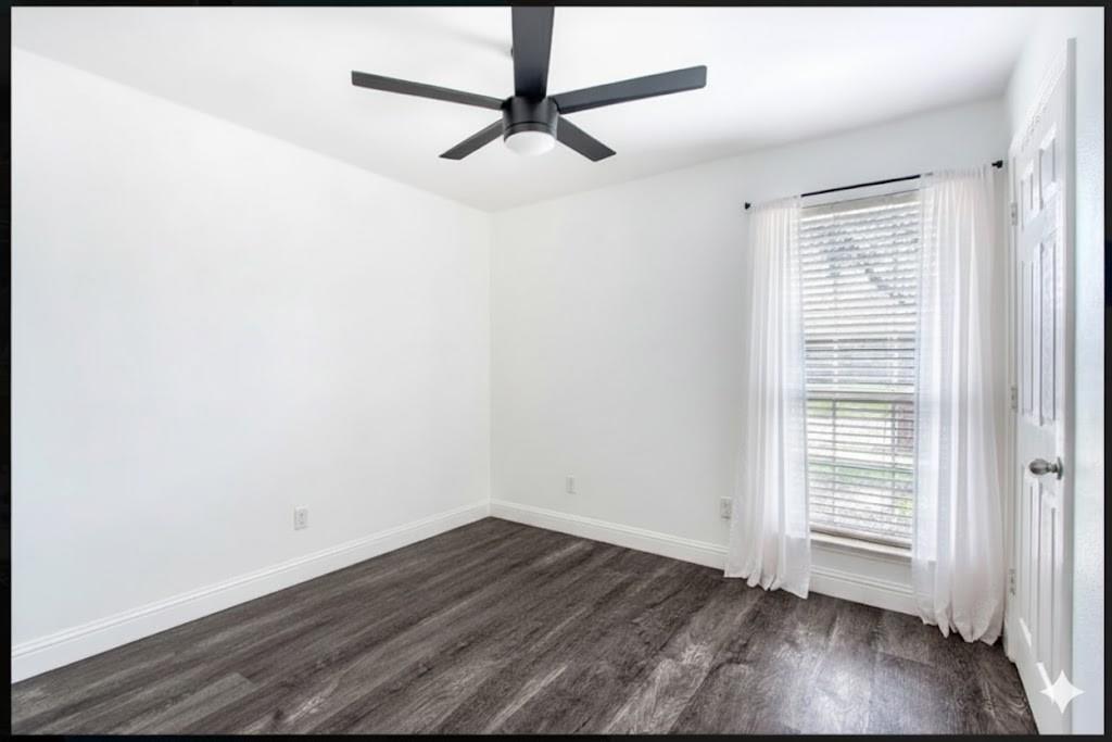 4020 Cherry Ridge Drive Frisco, TX 75033 - Photo 6 of 12 a view of a room with wooden floor and a window