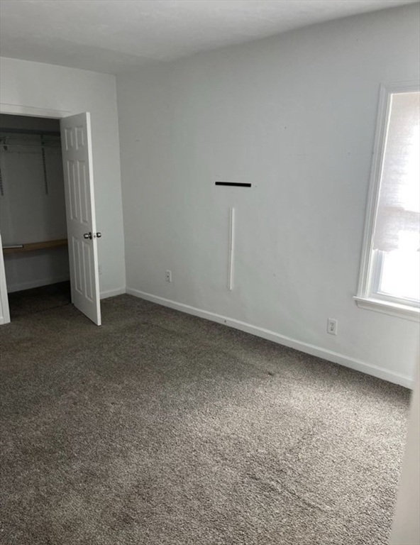 26 Edgeworth Street, Unit 1 Worcester, MA 01605 - Photo 11 of 13 an empty room with a window