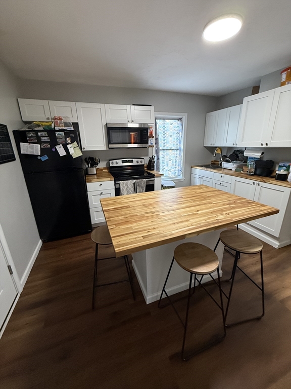 26 Edgeworth Street, Unit 1 Worcester, MA 01605 - Photo 3 of 13 a view of a dining room with furniture