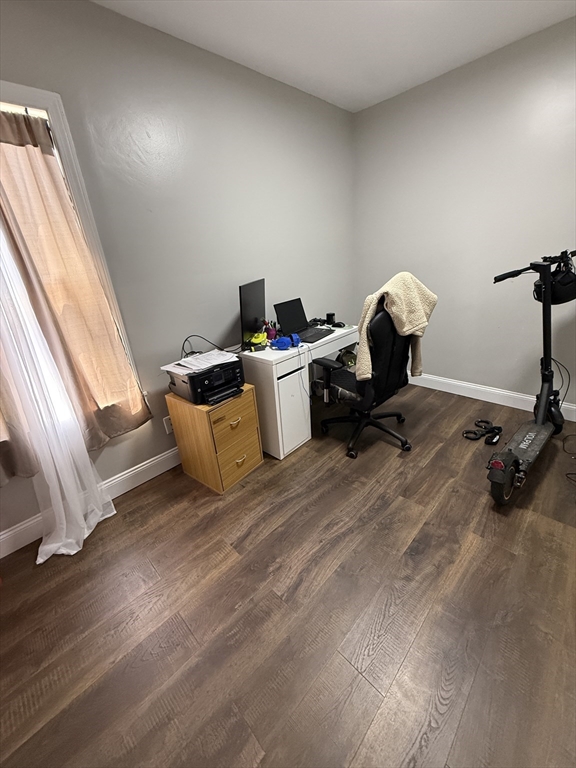 26 Edgeworth Street, Unit 1 Worcester, MA 01605 - Photo 9 of 13 a view of a workspace with furniture and a window