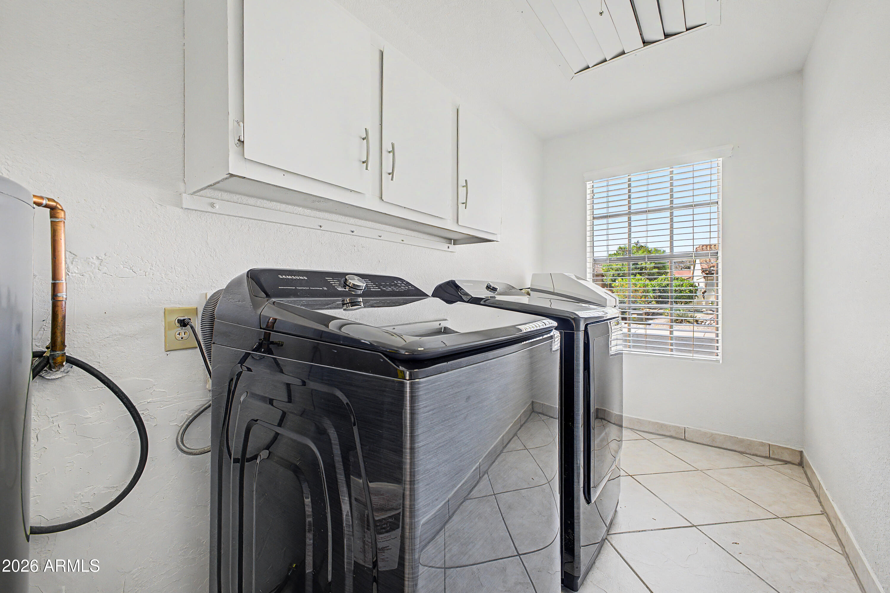 3322 East Dry Creek Road Phoenix, AZ 85044 - Photo 52 of 66 Full-Size Laundry Room