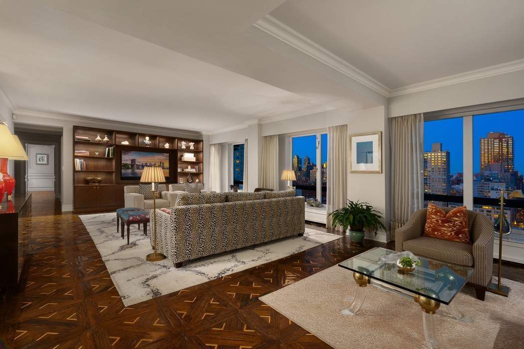 530 East 76th Street, Unit 22CDEG Manhattan, NY 10021 - Photo 5 of 31 a living room with furniture and a couch