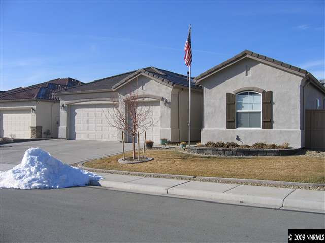 10575 Autumn Walk Court Reno, NV 89521 - Photo 1 of 2 a front view of a house with garden
