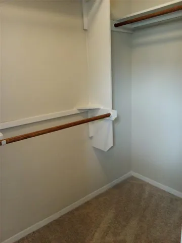 a view of small space with racks on the wall
