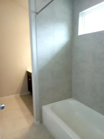 a bathroom with a bathtub