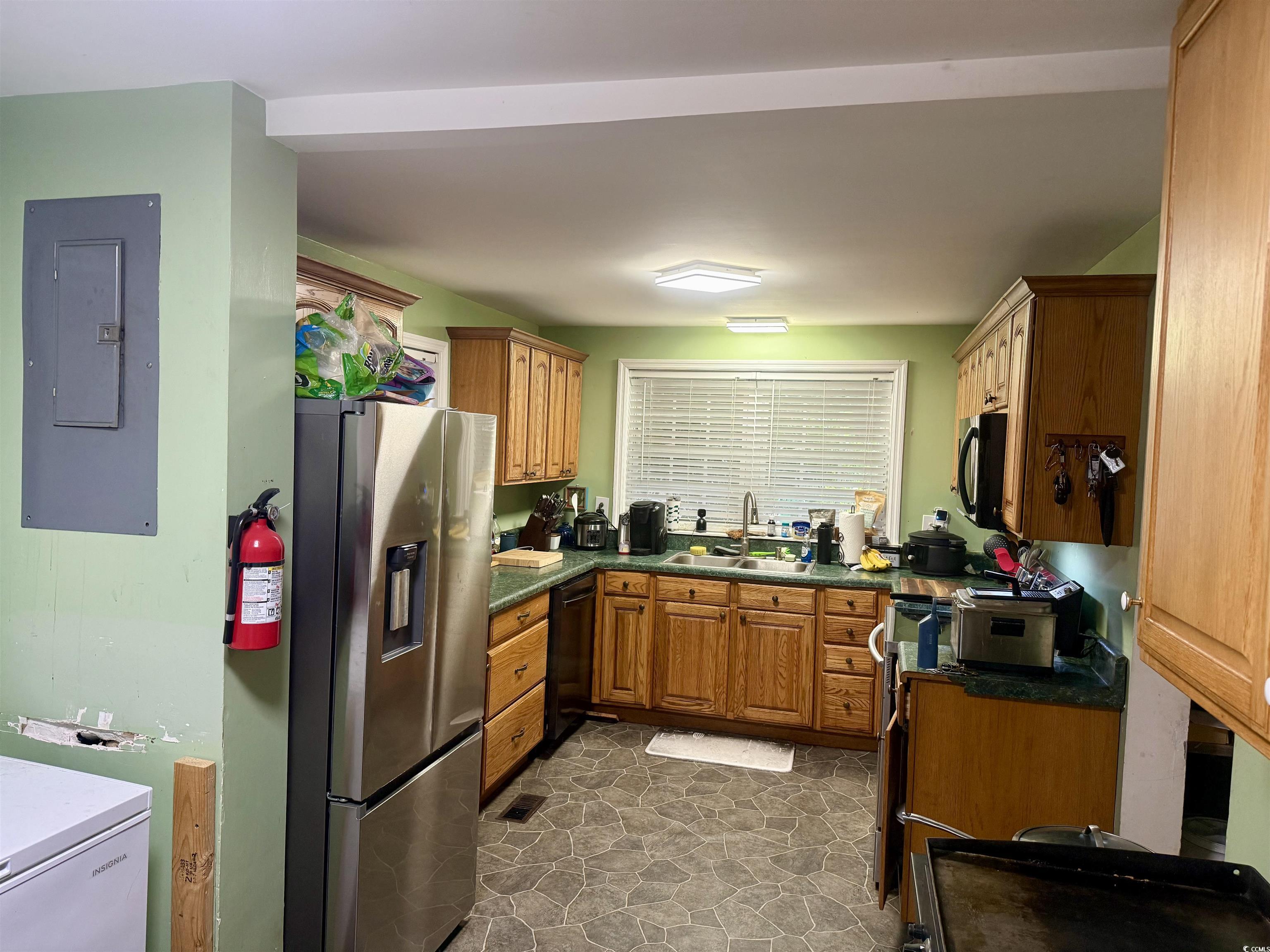 2408 South Island Road Georgetown, SC 29440 - Photo 14 of 35 Kitchen featuring stainless steel fridge with ice