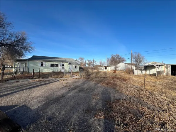 a view of a street with cars on city street