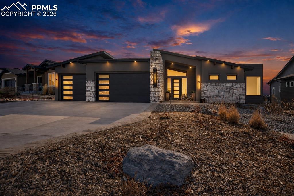 Colorado Luxury—Elevated in Design, Intentional in Every Detail, and Unforgettable in its Setting. A custom Saddletree ranch set on a .29-acre executive homesite, intentionally oriented to capture panoramic Pikes Peak and Front Range views.