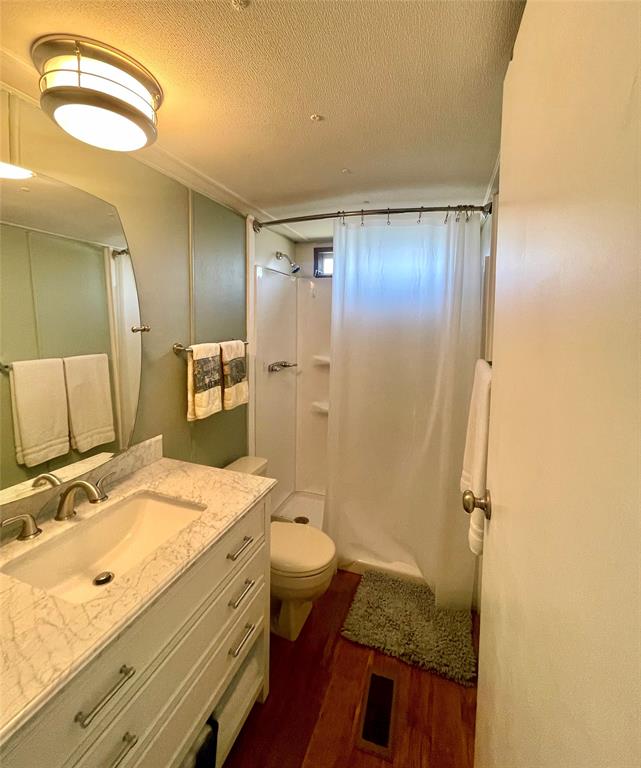 2334 San Bar Road, Unit 96 Graford, TX 76449 - Photo 36 of 40 Newly updated primary en-suite features a large sink and step in shower.