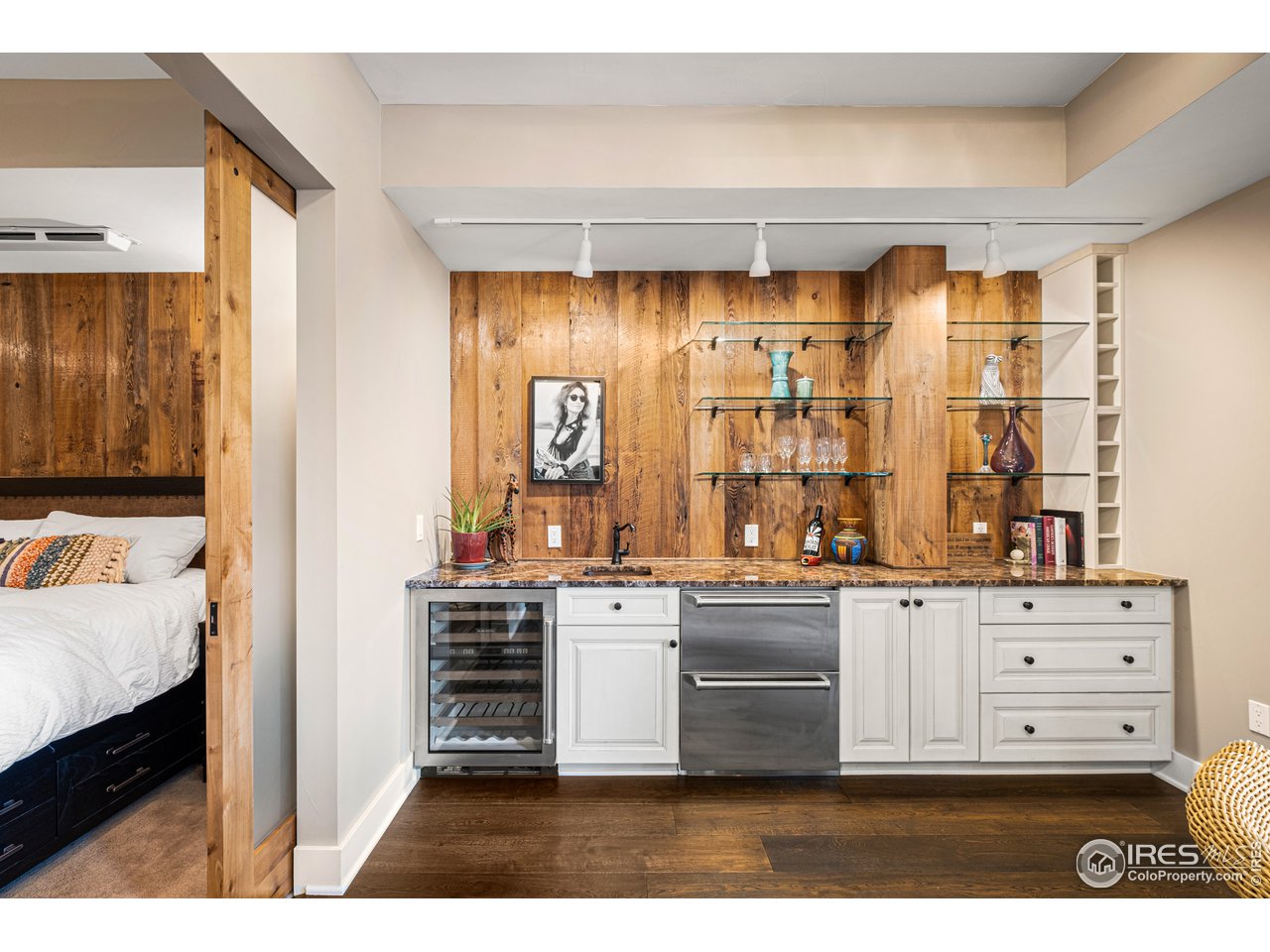 901 Pearl Street, Unit 202 Boulder, CO 80302 - Photo 14 of 35 a view of cabinets with wooden floor and cabinet