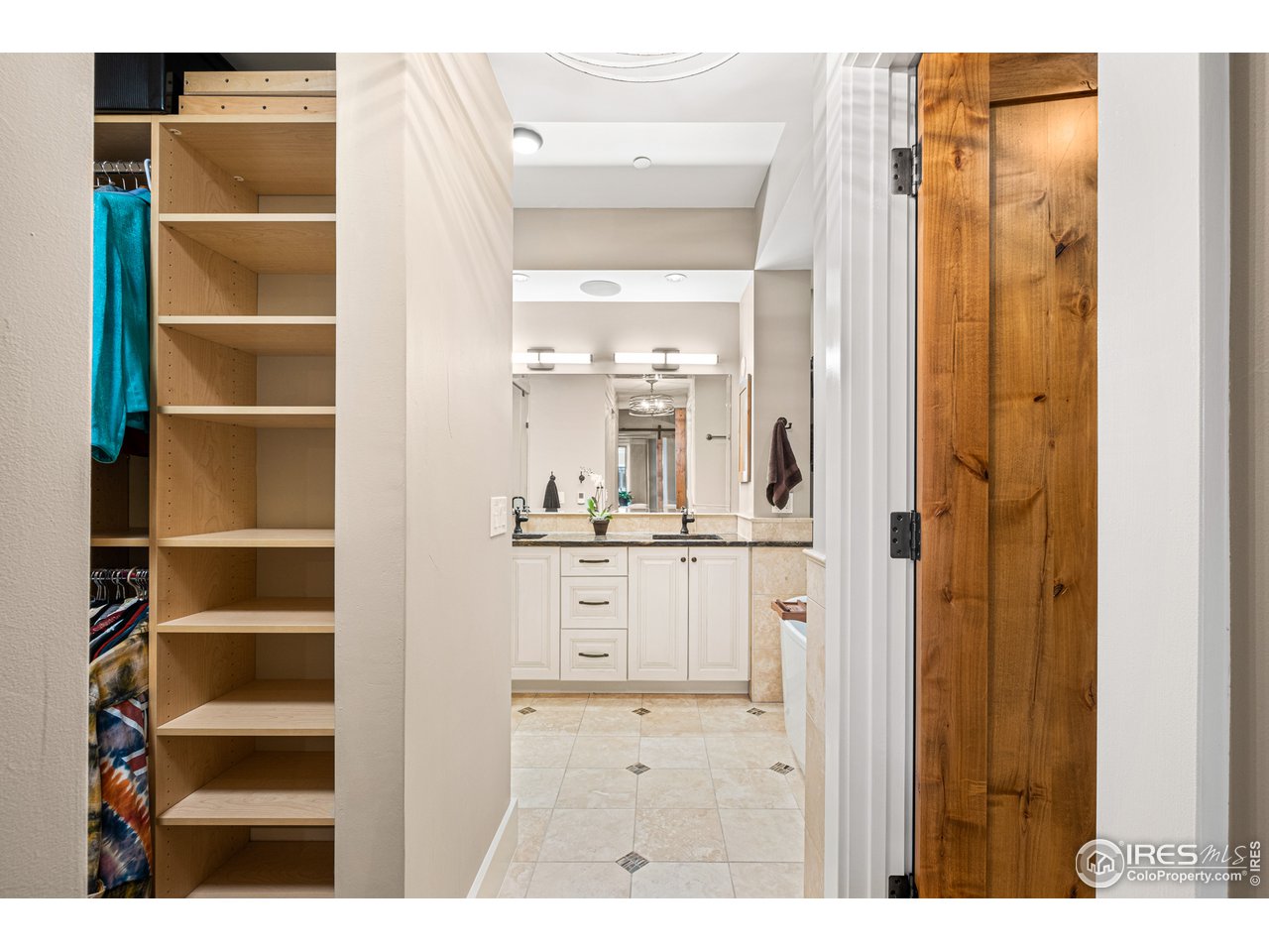 901 Pearl Street, Unit 202 Boulder, CO 80302 - Photo 21 of 35 a view of walk in closet with empty racks