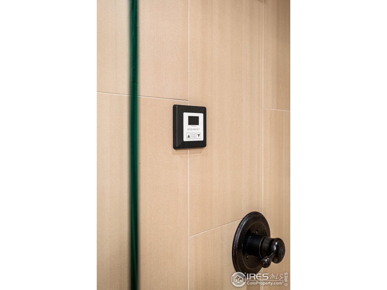 901 Pearl Street, Unit 202 Boulder, CO 80302 - Photo 24 of 35 a close up of a wall with a mirror